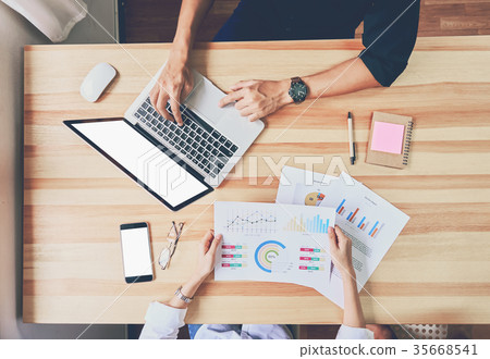 Young businesswoman in office and working. Young businesswoman in office and working. 35668541
