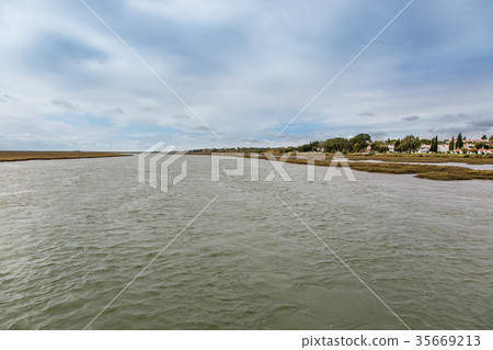 Gilao River and wetlands near Tavira, Portugal Gilao River and wetlands near Tavira, Portugal 35669213
