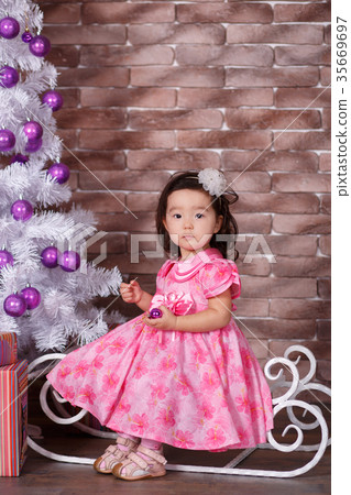 Asian little cute girl wearing pink casual dress Asian little cute girl wearing pink casual dress 35669697