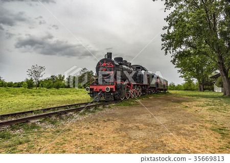 Train and steam locomotive Train and steam locomotive 35669813