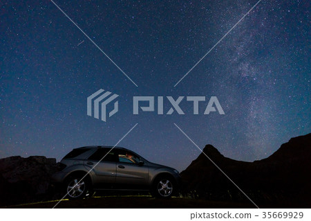 Night landscape with a car on the background of 35669929