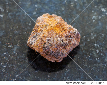 rough limonite (iron ore) stone on dark rough limonite (iron ore) stone on dark 35671044