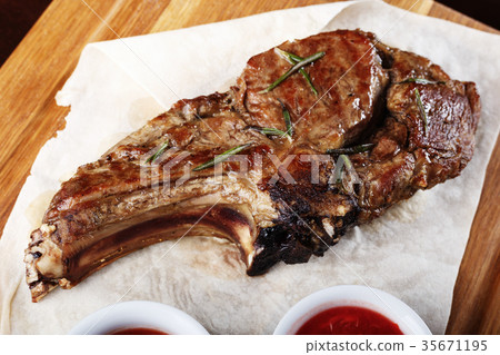 ribeye steak with sauce 35671195