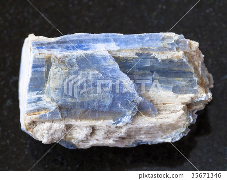 raw kyanite stone on dark background 35671346