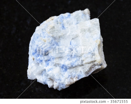 raw vishnevite stone on dark background raw vishnevite stone on dark background 35671555