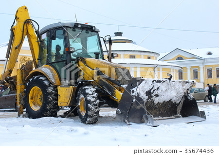 tractor for snow removal is parked on a city tractor for snow removal is parked on a city 35674436