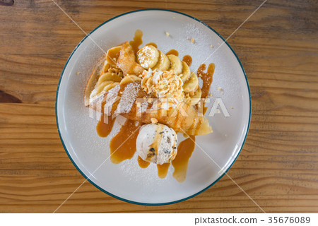 Fresh baked caramel banana crepe Fresh baked caramel banana crepe 35676089