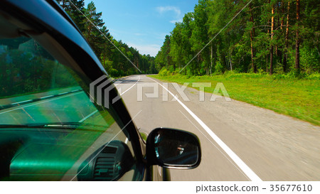 POV: Car is moving in the Wood on a road 35677610