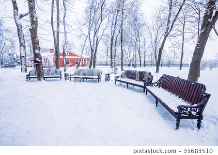 Shops in the snow in the city park Shops in the snow in the city park 35683510