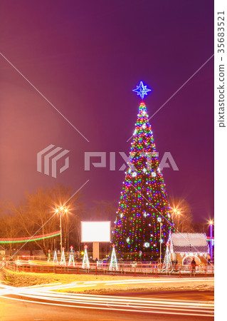 New Year tree with illumination in the city New Year tree with illumination in the city 35683521