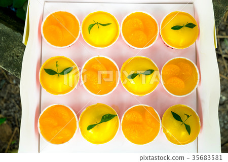 fresh orange cupcake in the paper package box 35683581