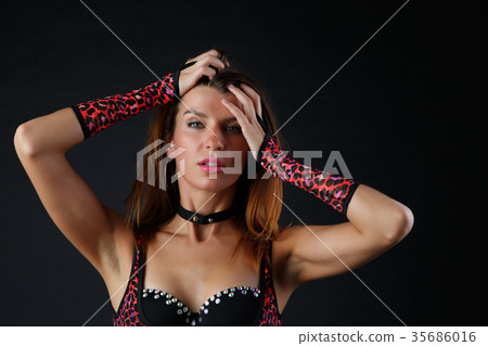 Photo of young model in red underwear, gloves Photo of young model in red underwear, gloves 35686016
