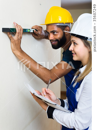 Engineers at the work. 35687249