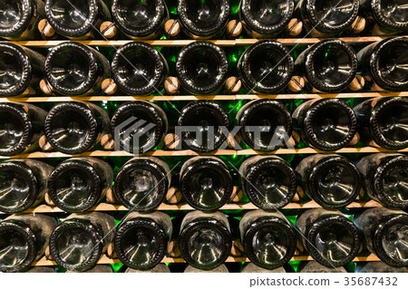 Racks with bottled wine in plant storage 35687432