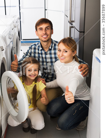 Family choosing washing machine 35687899