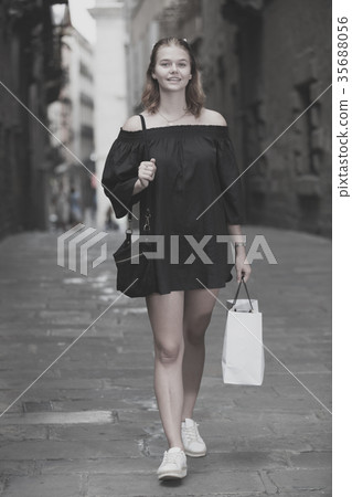 smiling young girl teenager walking 35688056