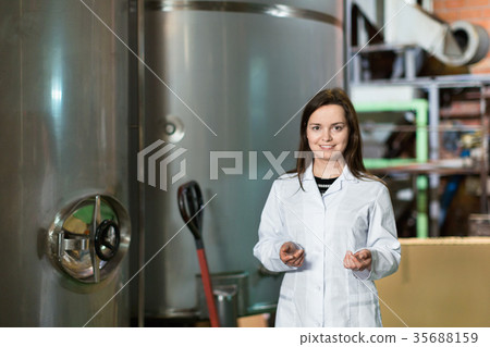 Portrait of ordinary efficient female engineer 35688159