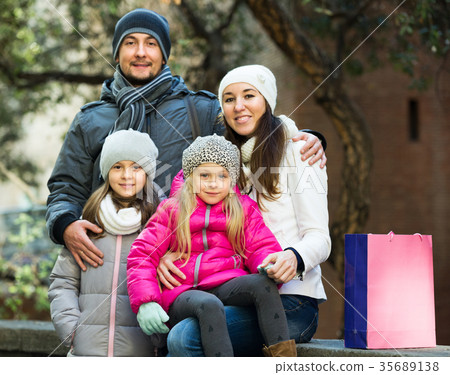 Family with two children posing Family with two children posing 35689138