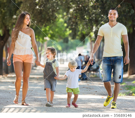 Family with kids in park 35689146