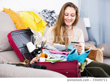 Female paying by credit card in internet store Female paying by credit card in internet store 35689711