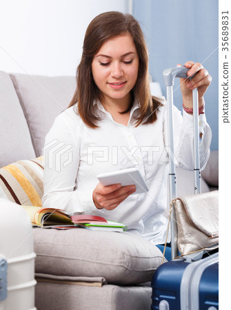 Woman booking online 35689831