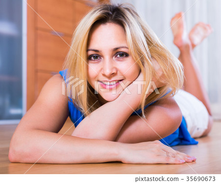 Portrait of girl with charming smile indoors 35690673