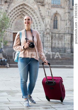 Girl tourist is walking 35691028