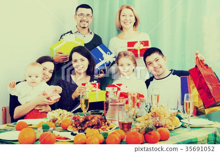 Big family at festive table Big family at festive table 35691052