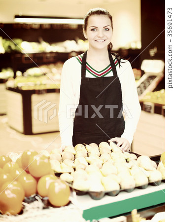 Girl deciding on fruits 35691473