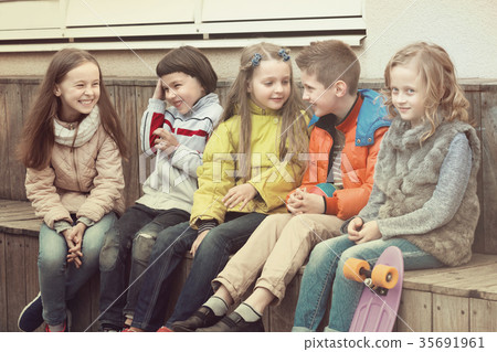 Kids sharing secrets as talking 35691961
