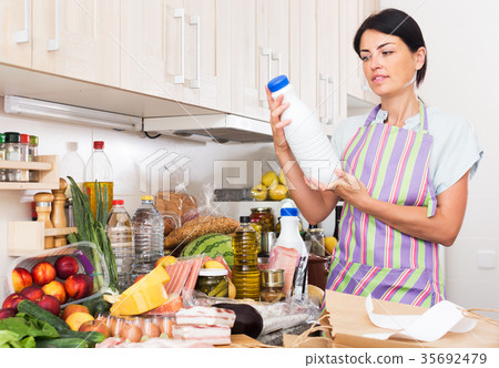 Woman with dairy products 35692479