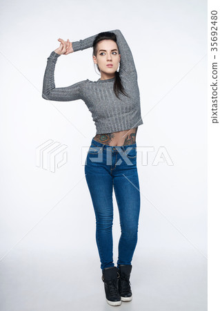 Full length funky woman looking to the side 35692480