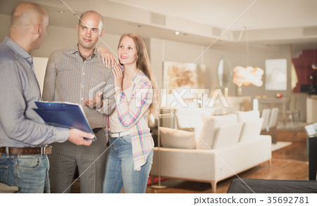 Seller offering family couple to choose furniture 35692781