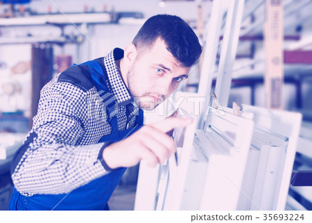 Production worker with PVC windows 35693224