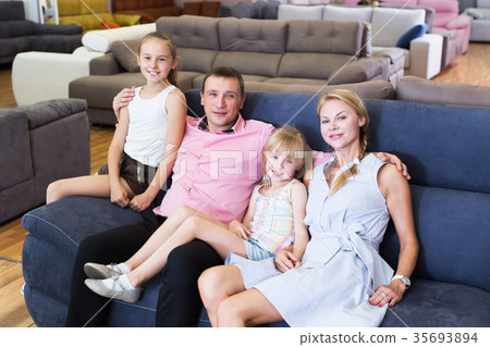 Family choosing sofa in store 35693894