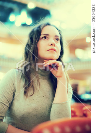 Woman theatre goer looking at dramatics play Woman theatre goer looking at dramatics play 35694328