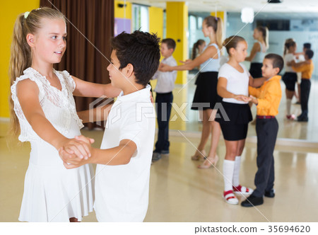 Children enjoying of partner dance Children enjoying of partner dance 35694620