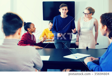 Students having conversation at recess 35694804