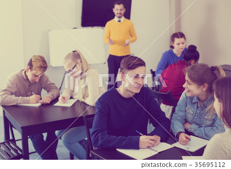 Classmates working in groups Classmates working in groups 35695112
