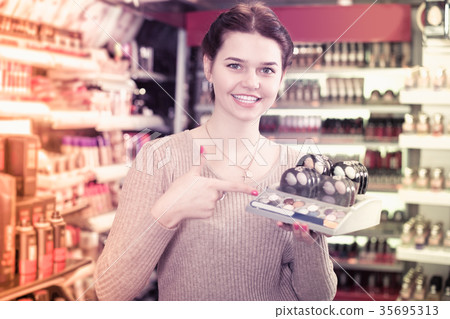 Seller demonstrating assortment 35695313