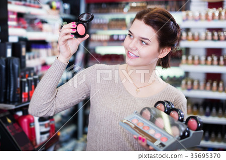 Seller demonstrating assortment 35695370