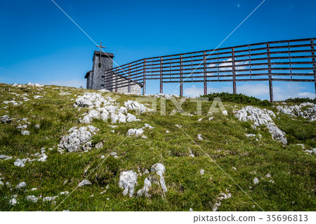 Scenic view of alps mountains a sunny day Scenic view of alps mountains a sunny day 35696813