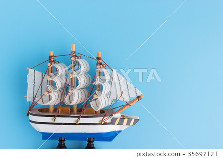 Toy ship on blue backround 35697121