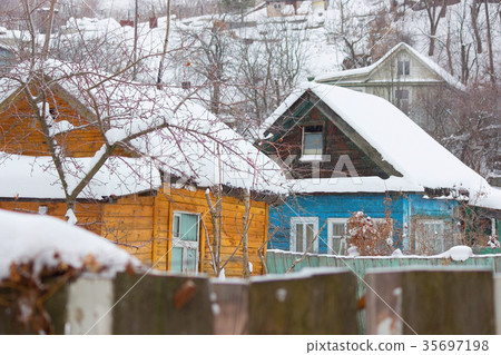 Snow house in winter dreamland at dawn in forest 35697198