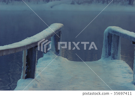 frozen wooden bridge 35697411