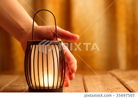 black lantern with a candle 35697505