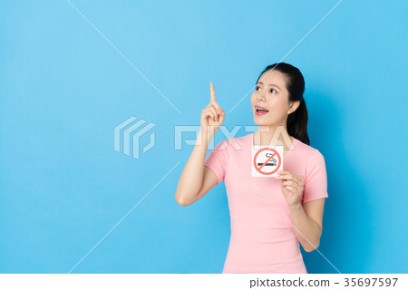 happy girl having good idea about quit smoking happy girl having good idea about quit smoking 35697597