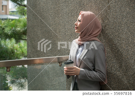 attractive pretty female muslim business employee 35697816
