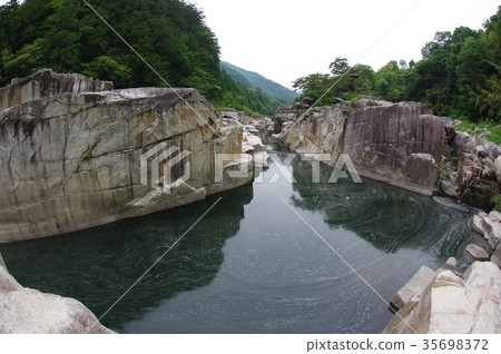 Shinshu Kiso Road scenic The bedridden floor The Taro Urashima legend which the eroded odd rocks in Kiso River also remains Shinshu Kiso Road scenic The bedridden floor The Taro Urashima legend which the eroded odd rocks in Kiso River also remains 35698372
