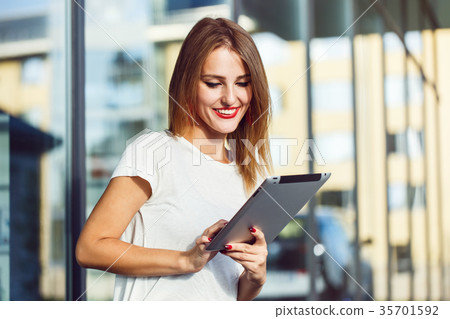 Girl with Tablet Girl with Tablet 35701592